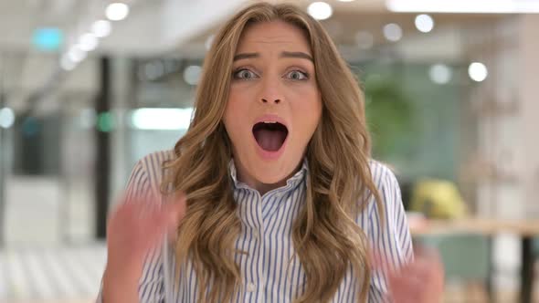 Portrait of Excited Businesswoman Celebrating Success