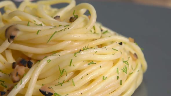 Spagetti Sprinkled with a Chopped Black Truffle