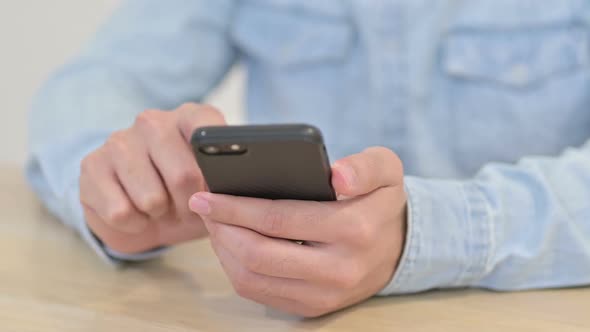 Close Up of Typing on Smartphone By Male Hands