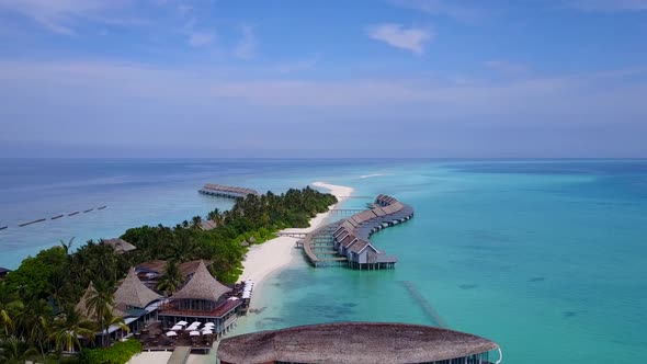 Aerial panorama of island beach journey by lagoon with sand background