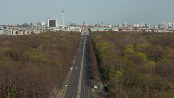 AERIAL: Strasse des 17. Juni with View on Brandenburg Gate in Berlin, Germany on Sunny Day