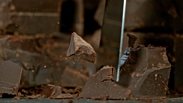 Super Slow Motion Shot of Cutting Raw Chocolate Chunk at 1000 Fps.