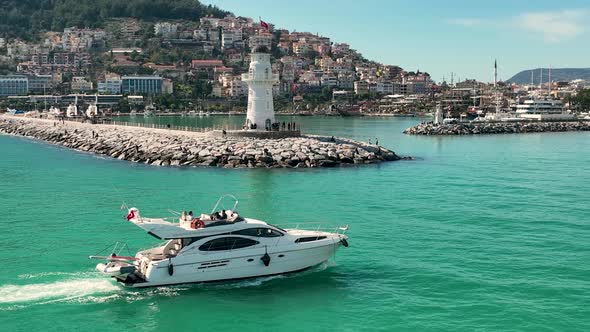 The yacht calls at the port aerial view 4 K