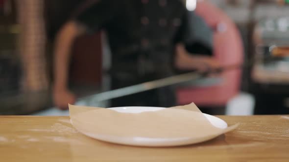 Delicious Ready Pizza Lying on Round Plate