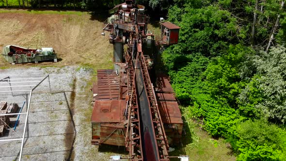 Abandoned bucket wheel excavator drone video