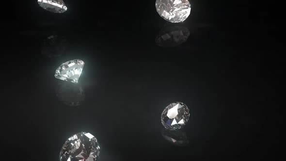 Diamonds Drop onto Shiny Black Surface Loop