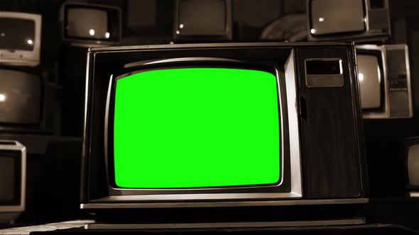 Retro TV with Green Screen between Many Old Vintage TVs. Sepia Tone. 4K Version.