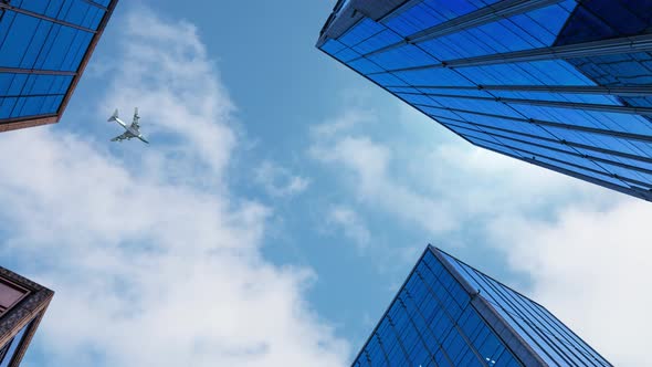 airplane flying over roof