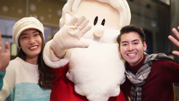 Merry Christmas and Happy New Year. Young  asian couple with Christmas
