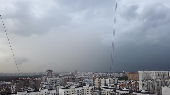 Heavy Thunderstorm Over a Big City. Stormy Front Goes Into the Distance. Weather Cataclysm, Rainy