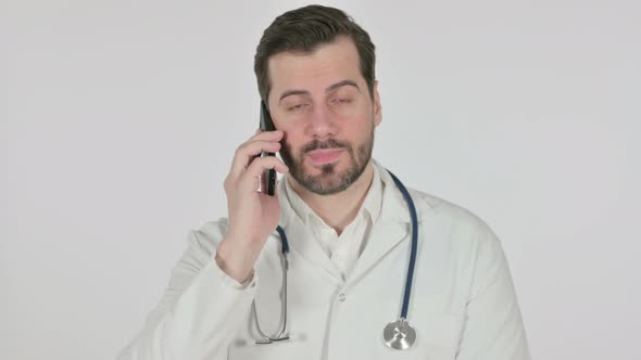 Portrait of Doctor Talking on Smartphone White Screen