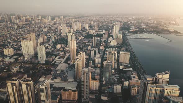 Metropolis City at Sea Bay Sunrise Aerial