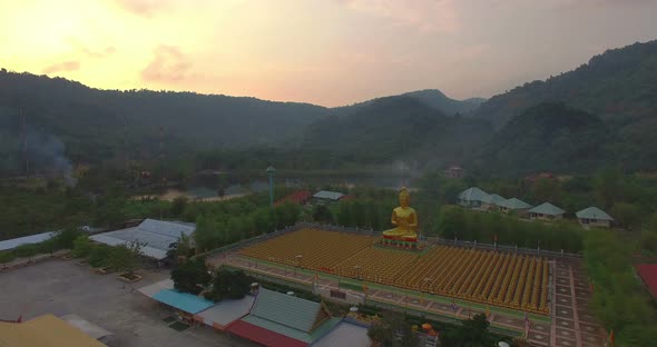 Buddha And Adherents In Valley