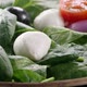 Cherry tomato and mozzarella falling down in fresh salad - VideoHive Item for Sale