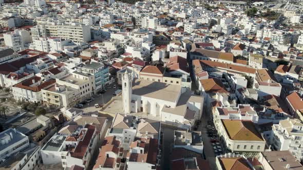 Main Church or Igreja Matriz of Portimao, Portugal. Aerial circling