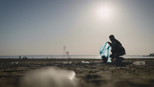 A Group of Ecoactivists Collects and Sorts Garbage on the Beach