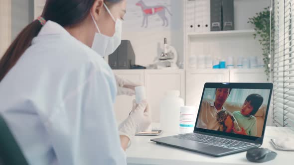 Asian veterinarian girl talk to pet owner on online virtual video call to give treatment plan.