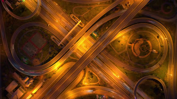 4K : Time lapse Aerial view and top view of traffic on city. Expressway with car lots