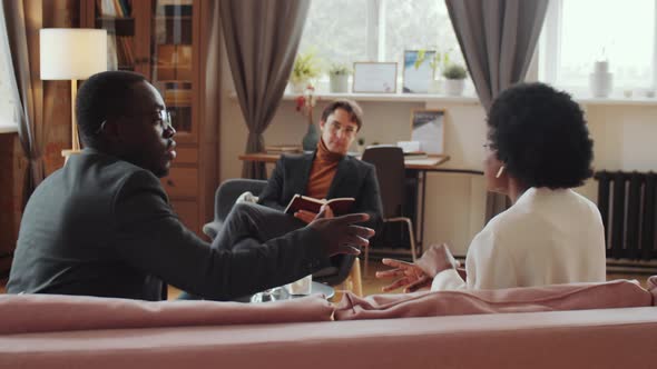 African American Couple Arguing on Session with Therapist