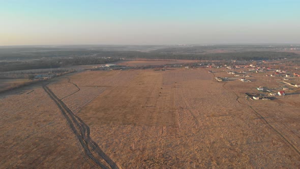 Agricultural Field And Dirt Road