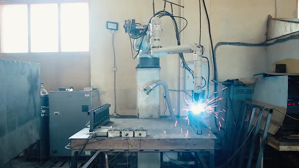 An electric welding machine performs welding work with the part.