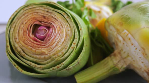 Cut Fresh Artichokes on Plate