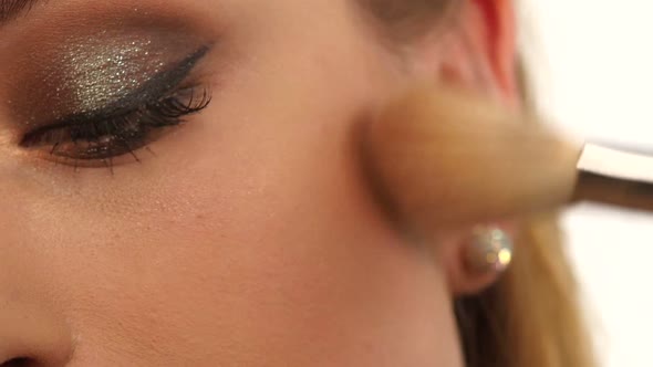 Make-up Girl, Woman Teenager Face with Make Up Brushes and a Blusher. Close Up