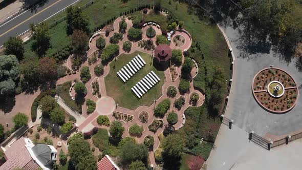 A drone shot closing in on a garden, reception venue in Cherry Valley, California in Riverside Count