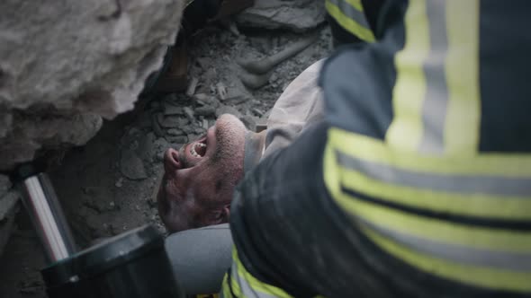 Crop Rescuers Saving Screaming Man From Ruins