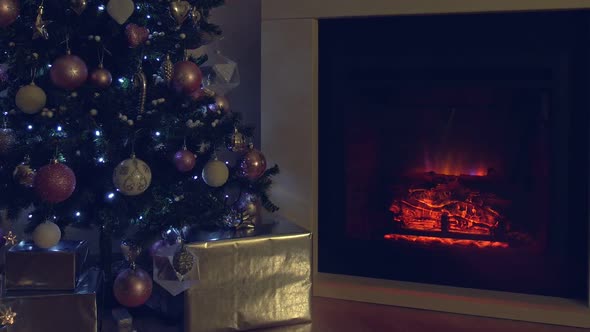 New Year and Christmas Celebration Near Fireplace in Cozy Room