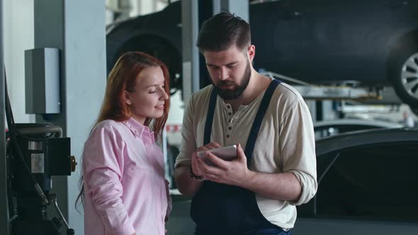 Female Client Speaking with Technician alt