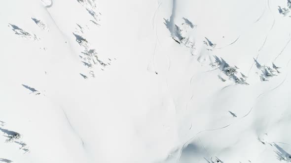 Skier skiing on a snow capped mountain