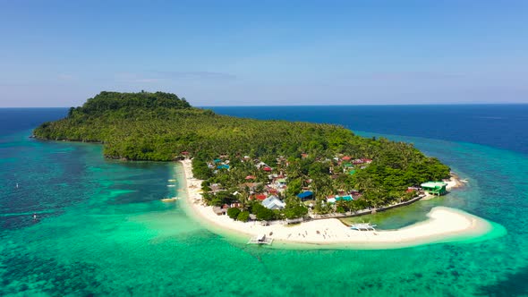 Village on a Tropical Island. Himokilan Island, Leyte Island, Philippines. Tropical Island with a