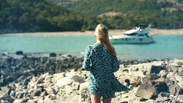 Woman Tourist Walking On Mediterranean Sea. Girl Exploring Old Town In Turkey. Greek Ancient Town