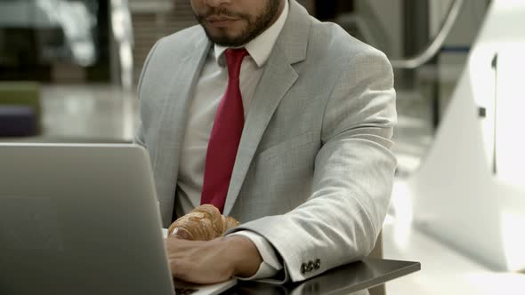 Handsome Bearded Businessman Working During Coffee Break