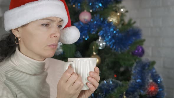 Upset Female with Coffee at Christmas