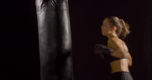 Athletic Woman Boxing Punching-Bag