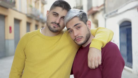 Lgbt Gay Male Couple Having Tender Moment Hugging Outdoor in the City