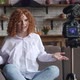 Young Redhaired Woman Blogger Filming Vlog Video for Internet with Camera at Home - VideoHive Item for Sale