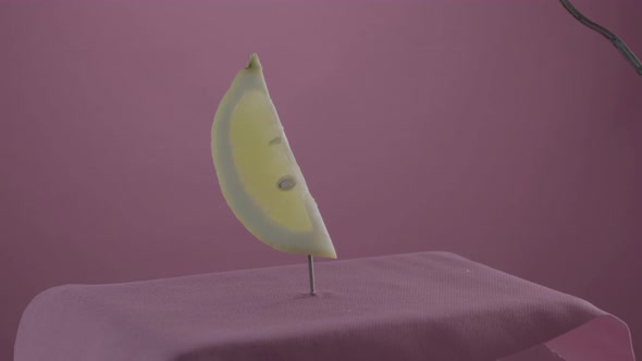 Lemon Rotating with Loop on Fuchsia Screen for Chroma Key