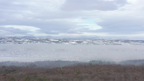 Highly polluted air above the valley 4K drone video