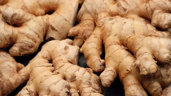 whole ginger root on close up rotating