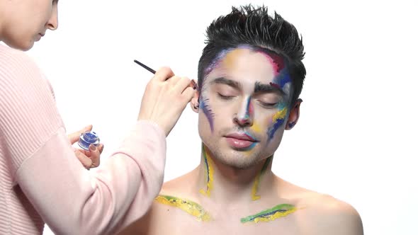 Visagist Applying Artistic Makeup.