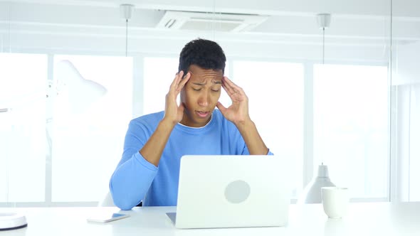 Afro-American Man with Headache, Tension and Stress