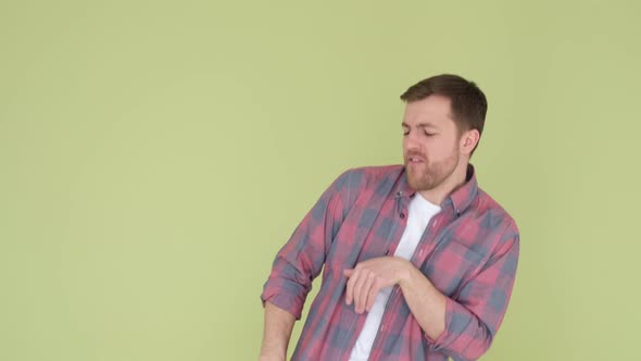 Handsome Man in Red Shirt Funny Dancing Isolated on Background in Studio Man Rejoices and Dances