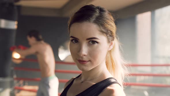 Portrait of Attractive Woman in the Boxing Club