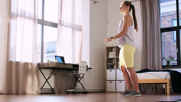 Happy Teenage Girl Exercising at Home