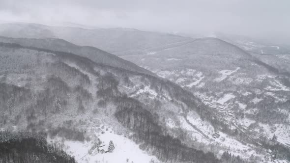 Aerial view of snow-covered mountain slopes