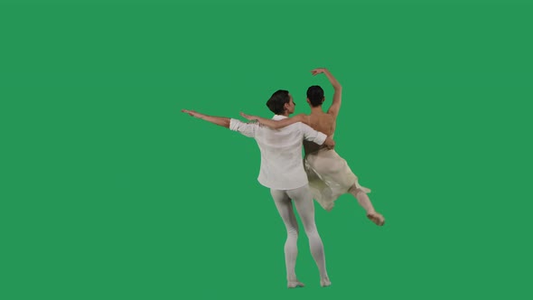 Professional Ballet Pair Practicing Moves on Green Screen
