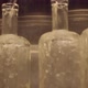 Whiskey pouring into bottles ready for labels - VideoHive Item for Sale